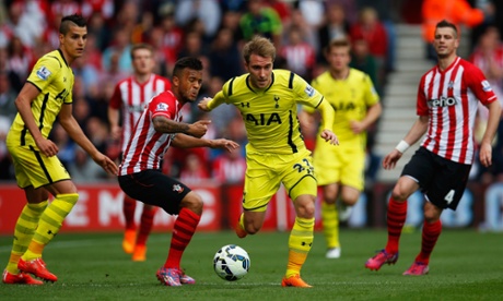 Christian Eriksen skips away from Ryan Bertrand.