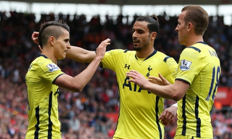 Spurs players celebrate after Chadli, centre, levels the scoring.