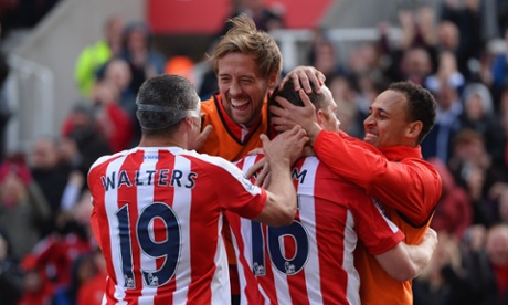 Smiles all round as Adam celebrates with team-mates.