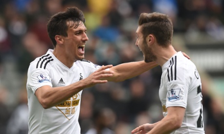 Swansea's Jack Cork, left, celebrates with team-mate Matt Grimes.
