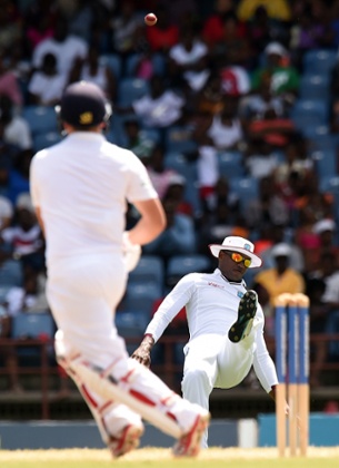 Marlon Samuels fails to hold onto the ball much to the relief of Gary Ballance.