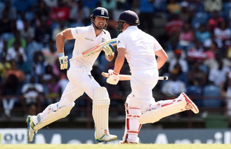 Alastair Cook and his Gary Ballance take a run.