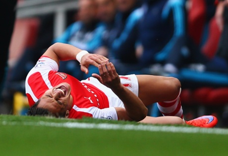 Alexis Sanchez of Arsenal is fouled.