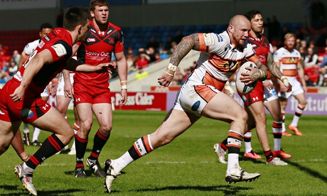 Castleford's Nathan Massey on his way to scoring his side's third try in their match against Salford