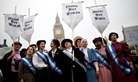 Feminist activists dressed as The Suffra