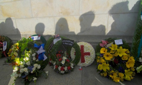 WELLINGTON, NEW ZEALAND - APRIL 25: People lay wreaths during the ANZAC Dawn Ceremony at the Pukeahu National War Memorial Park and Wellington Cenotaph on April 25, 2015 in Wellington, New Zealand.   People celebrated the centenary of the Australian and New Zealand Army Corp (ANZAC) landing on the shores of Gallipoli on April 25, 1915, during World War I. Anzac day is a national holiday in New Zealand and Australia, marked by a dawn service held during the time of the original Gallipoli landing and commemorated with ceremonies and parades throughout the day.    PHOTOGRAPH BY Sijori Images / Barcroft India  UK Office, London. T +44 845 370 2233 W www.barcroftmedia.com  USA Office, New York City. T +1 212 796 2458 W www.barcroftusa.com  Indian Office, Delhi. T +91 11 4053 2429 W www.barcroftindia.com100th anniversaryanzac daycelebrationscommemorationsdawn ceremonyGallipoli LandingInternationalnewsnew zealandsoldiersWorld War I
