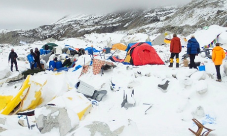 Tents lie damaged after an avalanche ploughed through Mount Everest base camp killing at least 18 people.