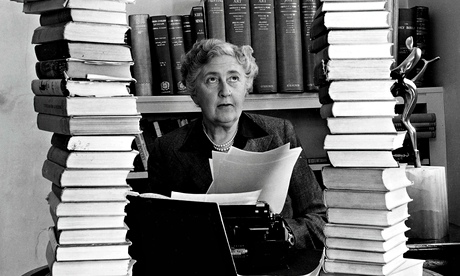 Agatha Christie, surrounded by some of her 80-plus crime novels.