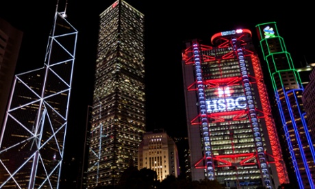 The Hong Kong and Shanghai Banking Corporation building in Hong Kong, right, where daily trading volume in HSBC shares was the second highest ever recorded following the news of its review.