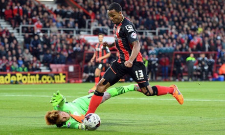 Smart save from Adam Bogdan as Callum Wilson tries to take the ball past him.