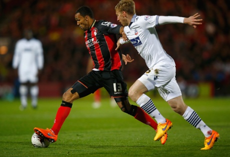 The dangerous Callum Wilson of Bournemouth takes on Tim Ream.