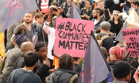 Hundreds join Reclaim Brixton in Windrush Square with banners and placards.