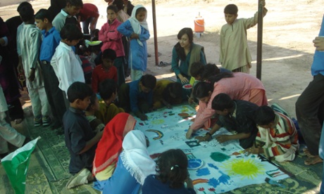 painting in school slums Pakistan
