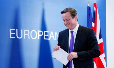 Britain's Prime Minister David Cameron leaves after a news conference following an European Union leaders summit in Brussels June 29, 2012.