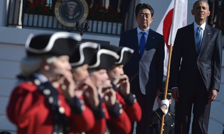 Barack Obama Shinzo Abe take part in the official welcome ceremony on the South Lawn of the White House.