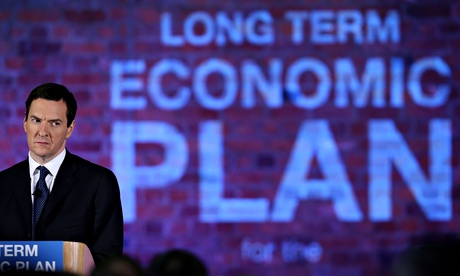 George Osborne in front of 'long term economic plan' slogan projected on to a brick wall