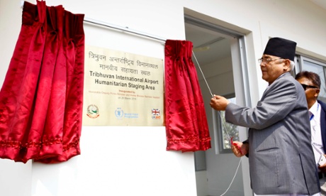 Deputy Prime Minister and Home Minister of Nepal Bamdev Gautam (L) inaugurates the first Humanitarian Staging Area at Tribhuvan International Airport in Kathmandu, Nepal, March 26, 2015. The United Nations World Food Programme (WFP) and the Ministry of Home Affairs and Civil Authority of Nepal inaugurated the country's first Humanitarian Staging Area here on Thursday.