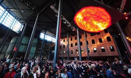 A sun is displayed on a screen during the inauguration ceremony of the new cultural centre the Alhondiga Bilbao designed by French architect Philippe Starck.