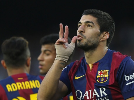 Luis Suarez celebrates scoring his 2nd.