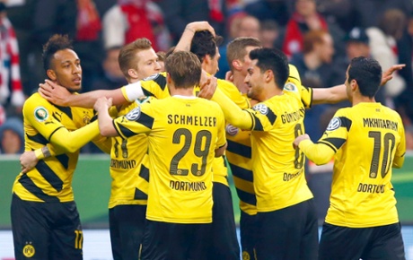 Borussia Dortmund’s Pierre-Emerick Aubameyang celebrates with his team mates after scoring