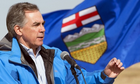 Alberta Premier Jim Prentice on the election campaign trail at an oil well site near Three Hills, Alberta, April 13, 2015. 
