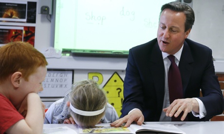 the prime minister, David Cameron, with schoolchildren