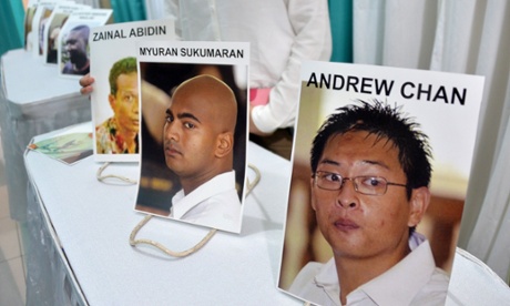Photographs of convicts Andrew Chan and Myuran Sukumaran, two members of the Bali Nine, are displayed at the hospital morgue in Jakarta.