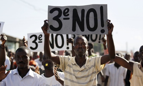 Protesters chant anti-government slogans during clashes with riot policemen in Bujumbura, 28 April.
