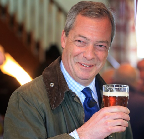 Nigel Farage drinks a pint to toast his support of grammar schools
