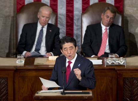 Shinzo Abe speaks before a joint meeting of Congress, while vice president Joe Biden, left, and house speaker John Boehner listen.