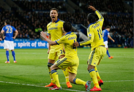 John Terry celebrates with team mates.