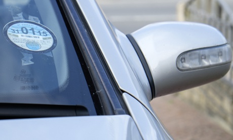 A car with a tax disc