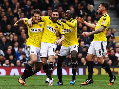 Stuart Dallas, second left, celebrates with his Brentford team-mates.