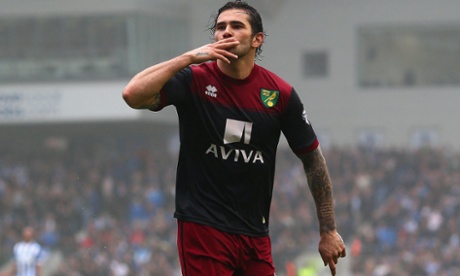 Bradley Johnson of Norwich celebrates scoring the opening goal.