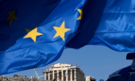The EU flag flies beneath the Parthenon temple on Acropolis hill in Athens, Greece