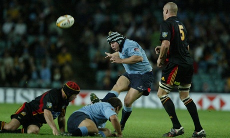 The Waratahs' Matt Dunning kicks a drop goal near the end of the game.