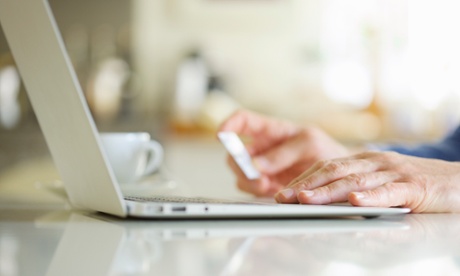 Man using laptop to shop online