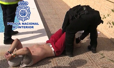 Andrew Moran under arrest.