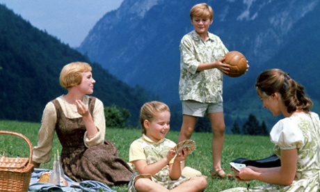 Julie Andrews, as Maria, and three of the Von Trapp children in the 1965 musical The Sound of Music.