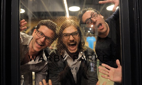 Ashton Kutcher with Warby Parker co-founders Dave Gilboa and Neil Blumenthal.