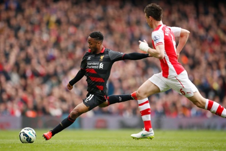 Raheem Sterling gets his shot away.