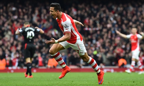 Arsenal's Alexis Sánchez celebrates after scoring their third goal against Liverpool.