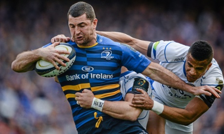 Rob Kearney of Leinster, is tackled by Bath's Anthony Watson.
