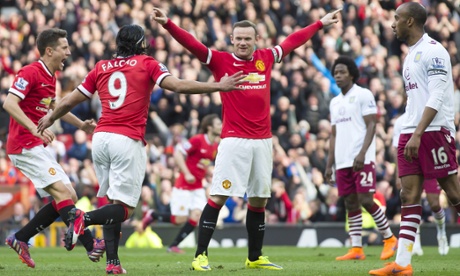 Manchester United's Wayne Rooney celebrates after putting his team 2-0 ahead against Aston Villa.