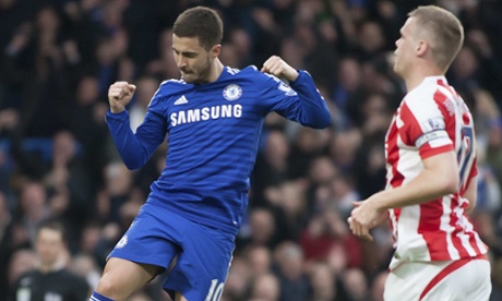 Eden Hazard celebrates scoring Chelsea's opening goal from the penalty spot against Stoke.