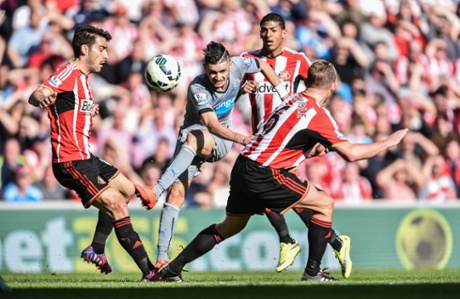 Remy Cabella strikes the ball.