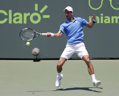 Novak Djokovic returns to Andy Murray,