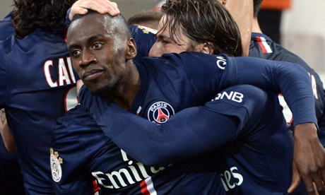 Blaise Matuidi, left, is mobbed by his PSG  team-mates after making it 1-1.