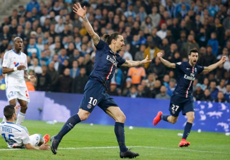 Zlatan Ibrahimovic, centre, celebrates after Jeremy Morel's own goal makes it 3-2 to PSG.