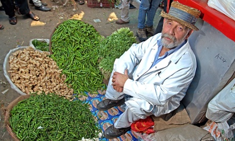 Roger Barton applies his skill in trading to selling chilli at Central de Abasto in Mexico City.